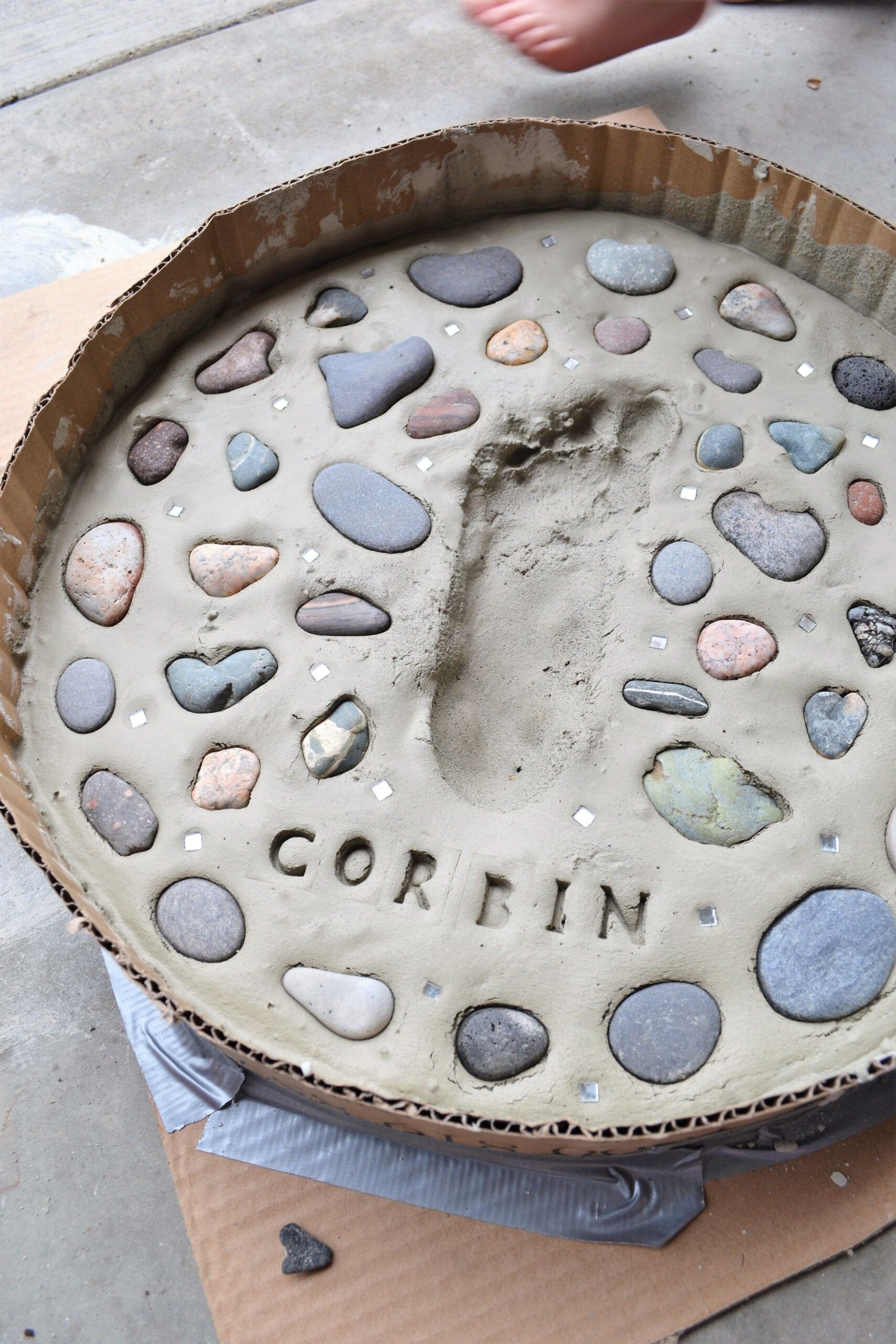 Diy Stepping Stones Kids Footprint Keepsakes With Diy Cement Molds ... within Kid's Handprint Stepping Stone Mold