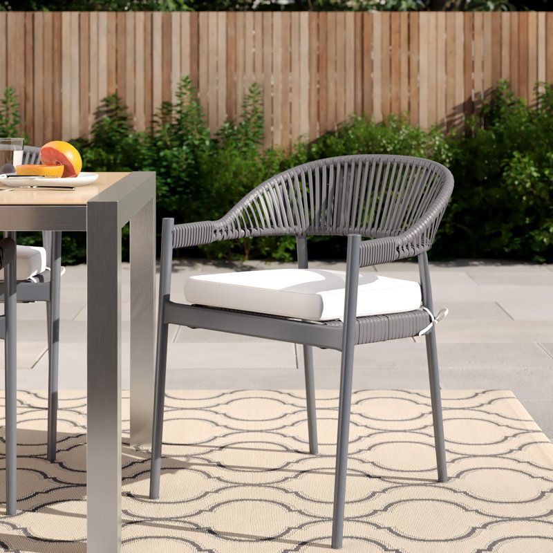 Foundstone™ Harmony Rope Stacking Patio Dining Chair With Cushion | Wayfair with Lanah Nautical Rope And Metal Outdoor Stacking Chair Set Of 2