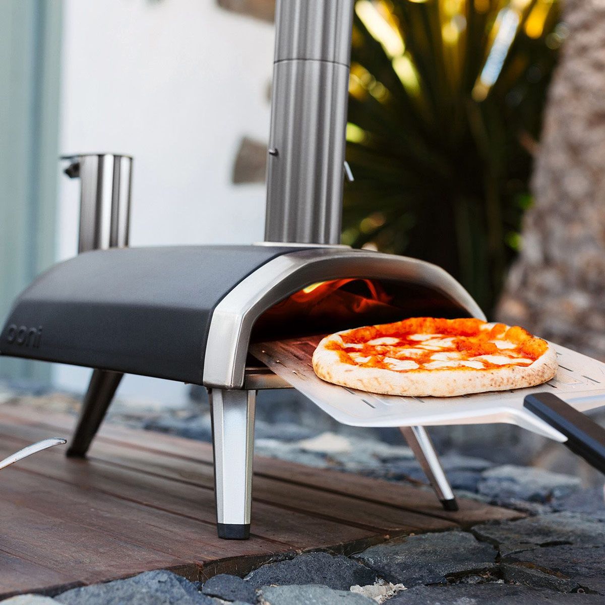 Ooni Fyra 12 Portable Wood-Fired Outdoor Pizza Oven | A Bell | Pizza Ovens within Outdoor Pizza Oven With Open Shelf And Wheels, Portable Wood Fired Pizza Maker