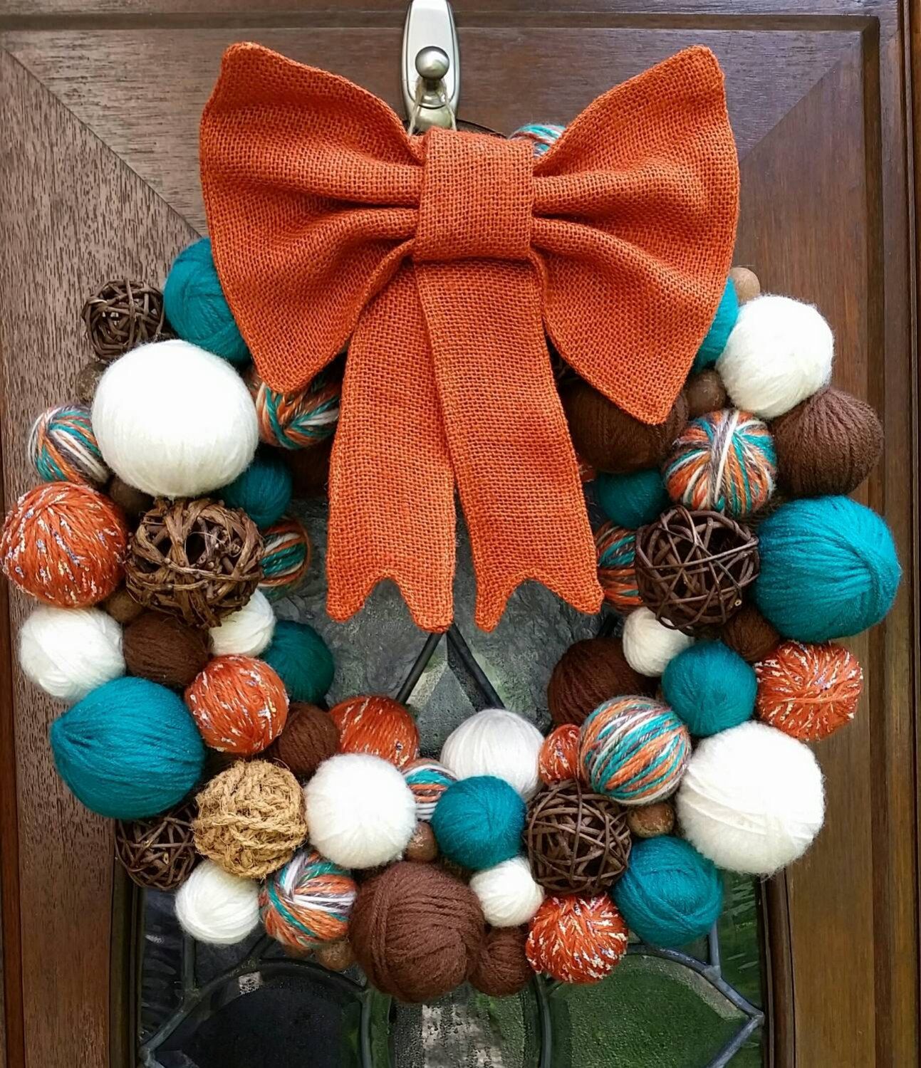 Brown, Burnt Orange, Teal And Cream Autumn Yarn Ball Wreath With Burnt ... regarding Unveiling the Beauty of Multi Orange and Brown Wreath Design Techniques