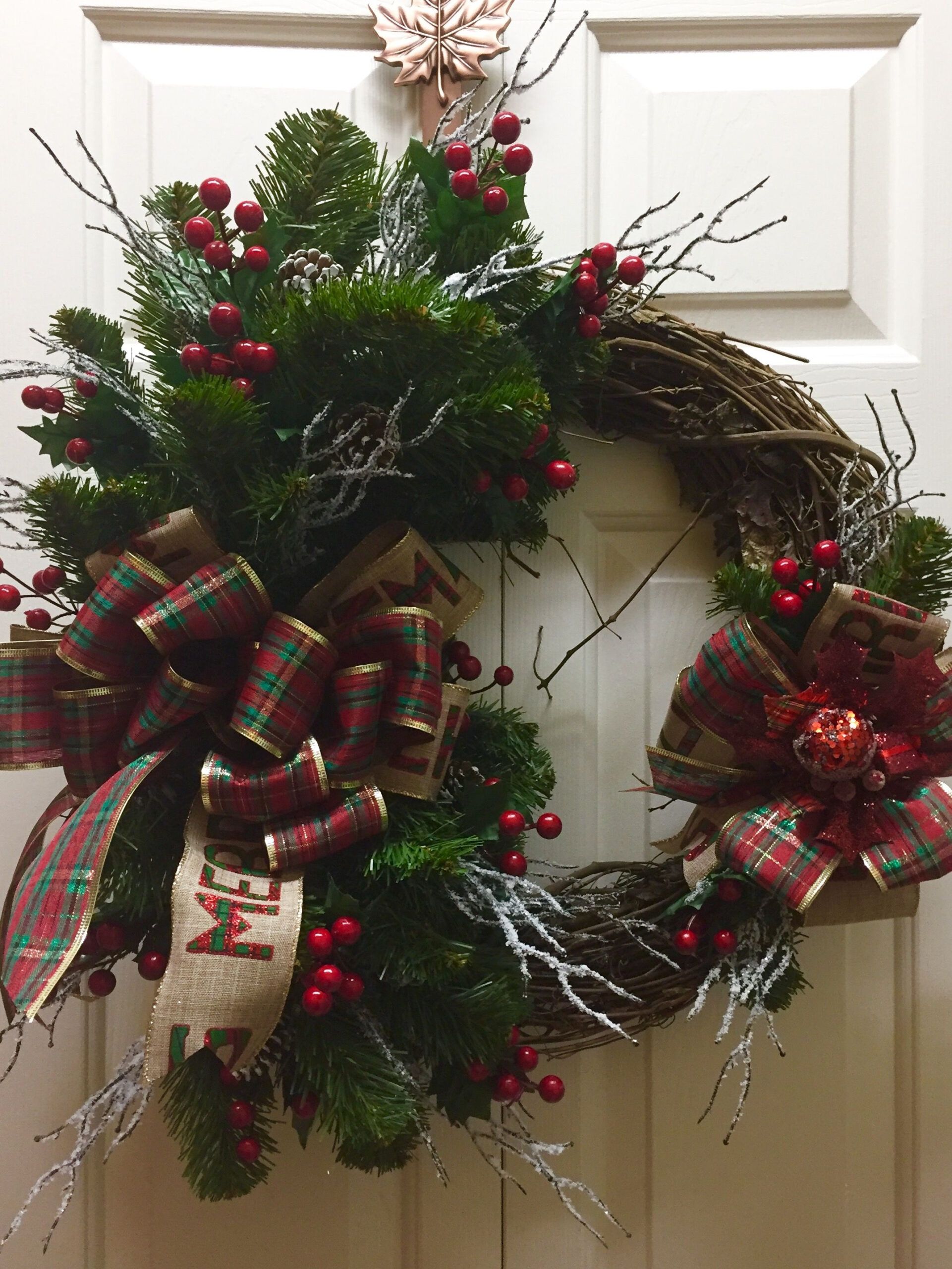 A Close Look at the Craftsmanship Behind Beautifully Iced Christmas Wreaths