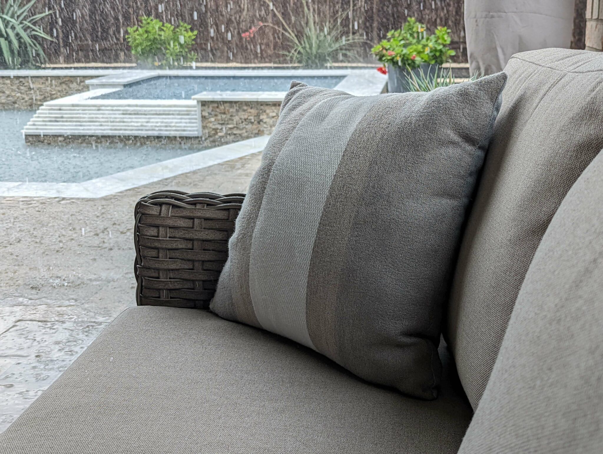 Can You Leave Sunbrella Cushions Out In The Rain? Our Full-Year ... in Why a 22.5x22.5 Sunbrella Beige Cushion is Your Patio's Best Friend