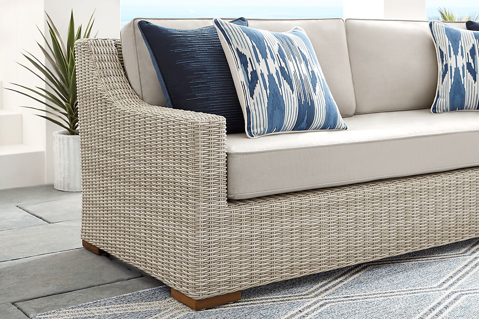 Patmos Gray Linen Beige Wicker Outdoor Sofa | Rooms To Go in Designing Your Perfect Patio with the Katti Light Gray Outdoor Sofa