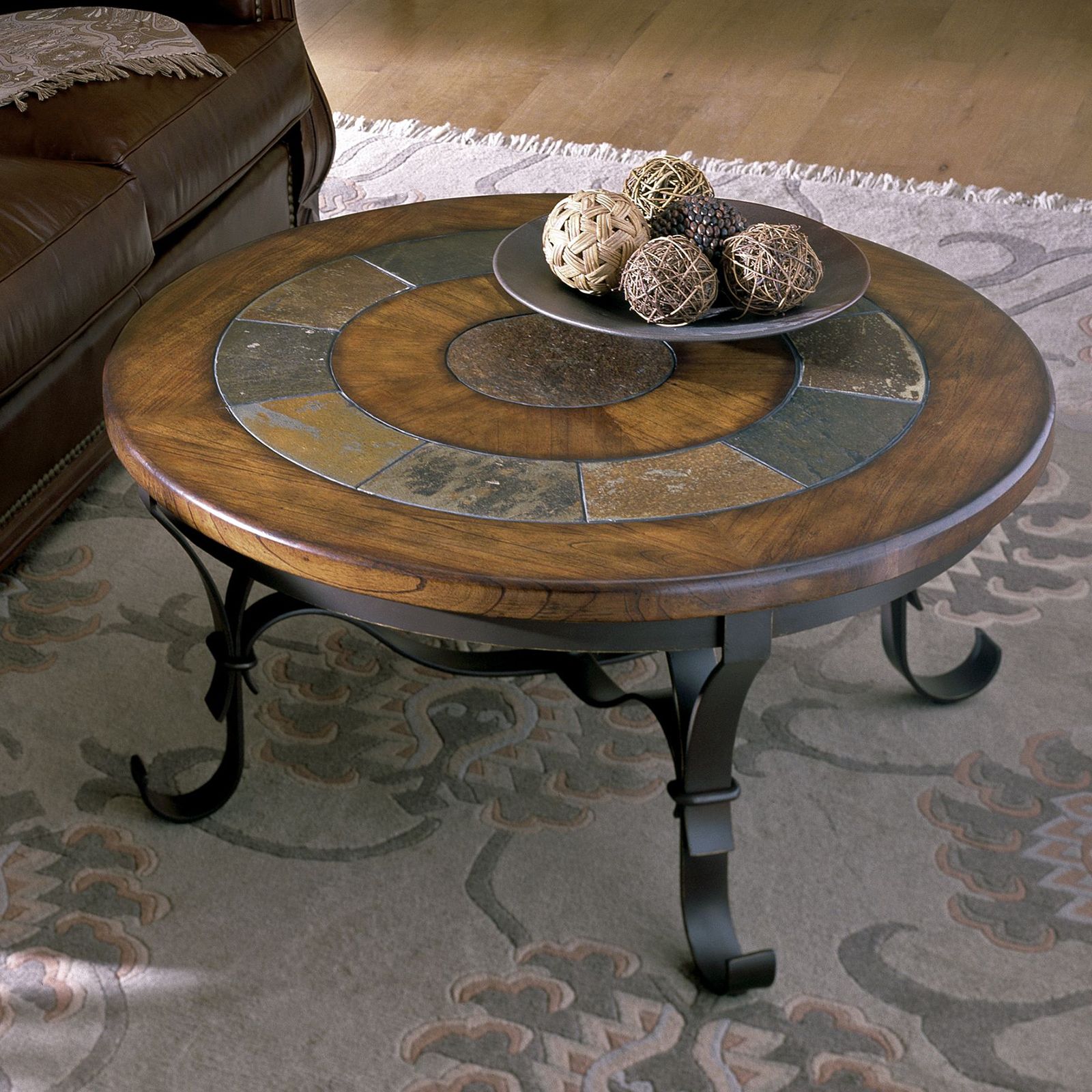 The Versatile Appeal of Round Tack Accent Tables in Slate Gray