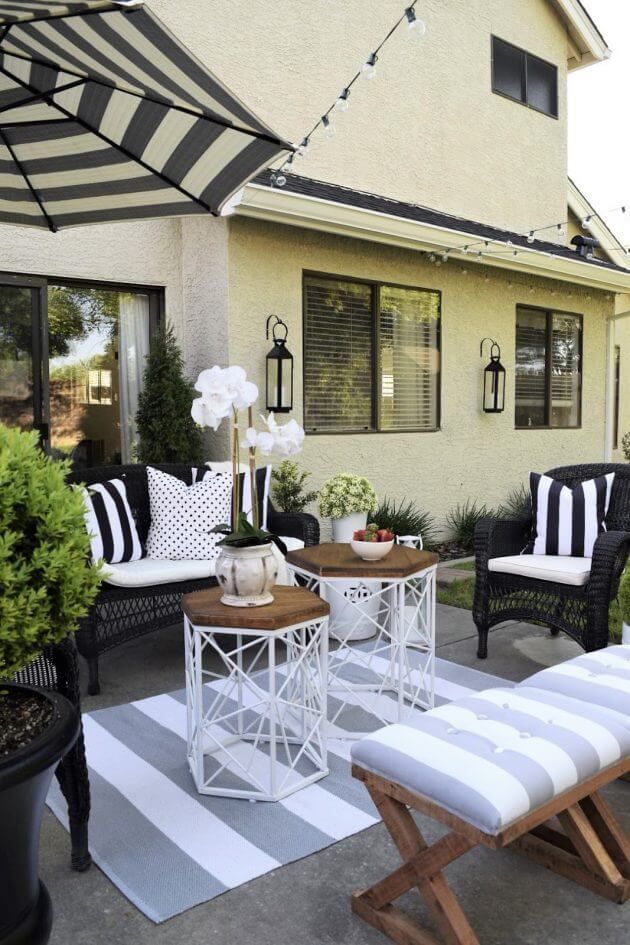 33 Best Outdoor Living Space Ideas And Designs For 2021 in The art of mixing textures in outdoor seating arrangements with striped pillows