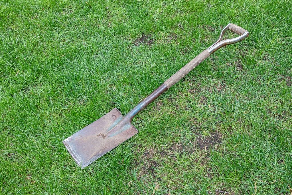 Garden Spade - The One Tool Every Gardener Needs! - Garden Tutor pertaining to Comparing recycled plastic garden spades with metal alternatives for long-term use