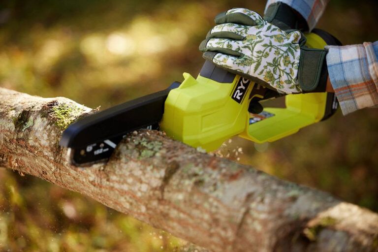 Ryobi 18V One+ Mini Pruning Chainsaw - Pro Tool Reviews for Environmental impact of sustainable pruning chainsaws compared to traditional models
